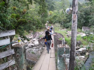People crossing a bridge
